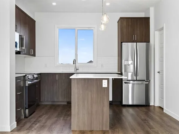 40 W Creekside Way SW #103, Calgary, AB T2X 4A9