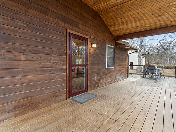 Front door and covered porch.