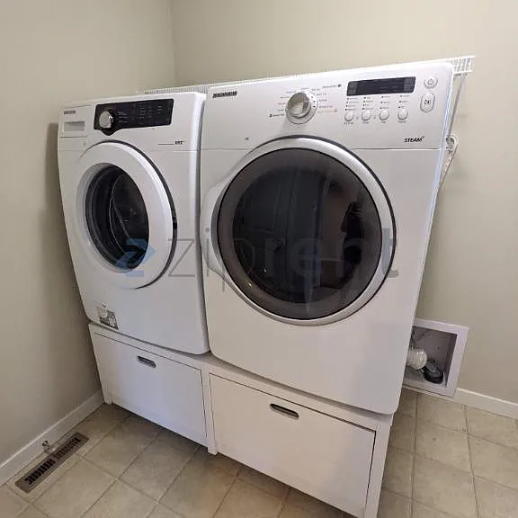 Laundry room with washer and dryer