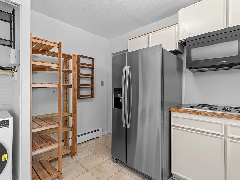 Additional shelving provides even more storage for pantry items and everyday kitchen essentials.