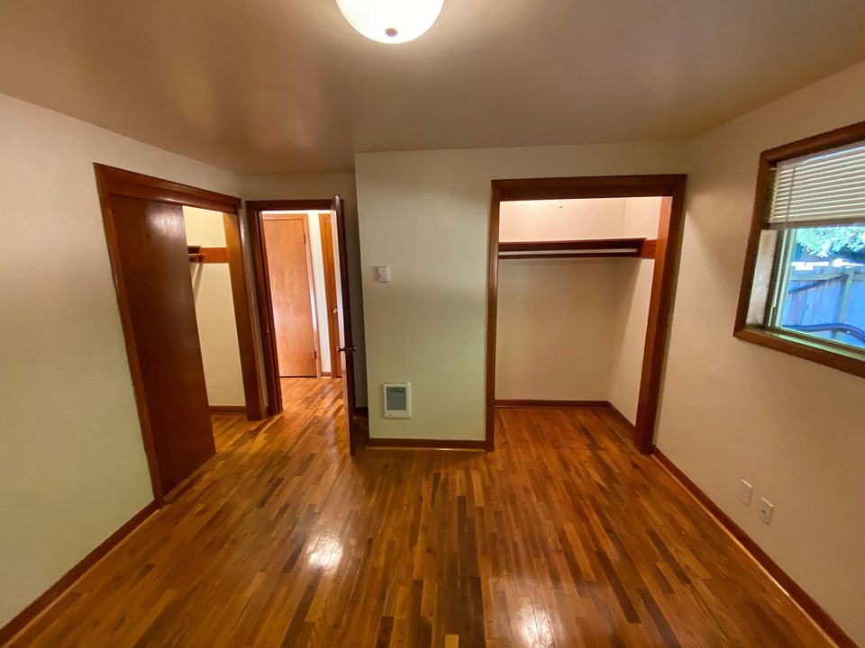 Bedroom with two ample closets and two additional closets in hall way