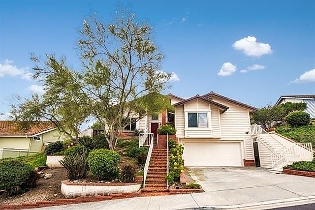 Single story, private, elevated home with relaxing hillside