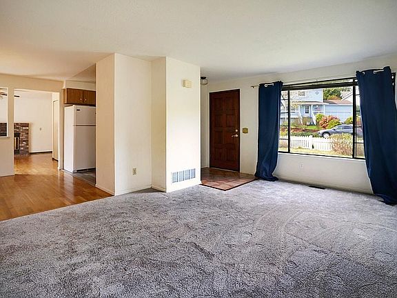 living room with brand new carpet