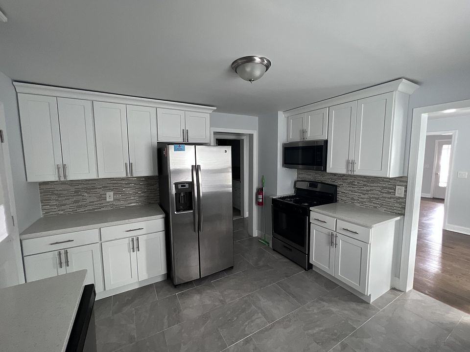 Our updated kitchen has all the stainless appliances you need - oven, stove, microwave, fridge, and dishwasher.