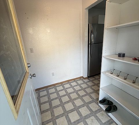 Back porch provides an entryway.