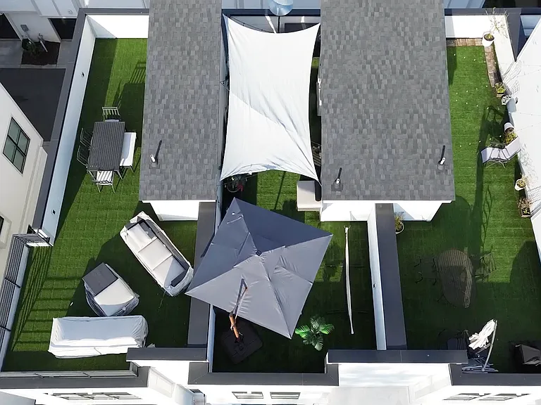 Rooftop is the middle one in this photo. Sail will stay providing ample shade!