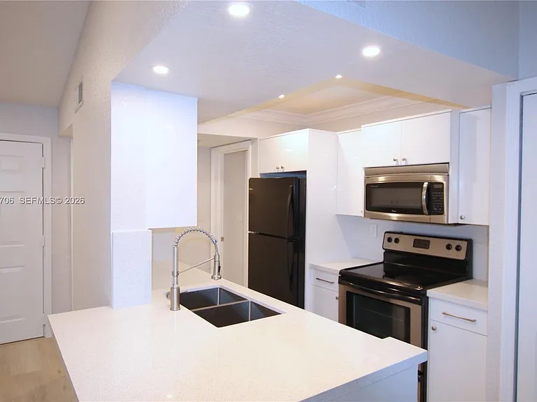 10681 SW 156th Pl #402 — Photo 8