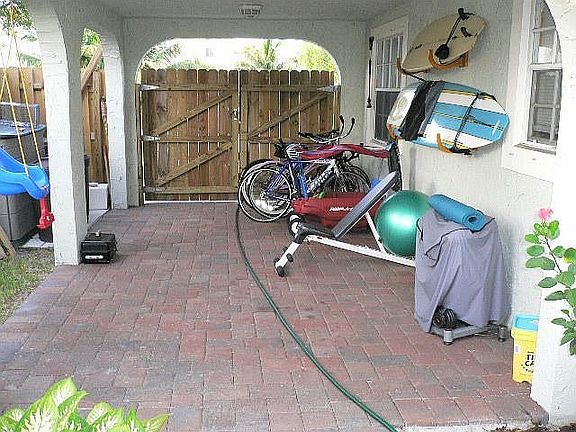 enclosed carport/storage area
