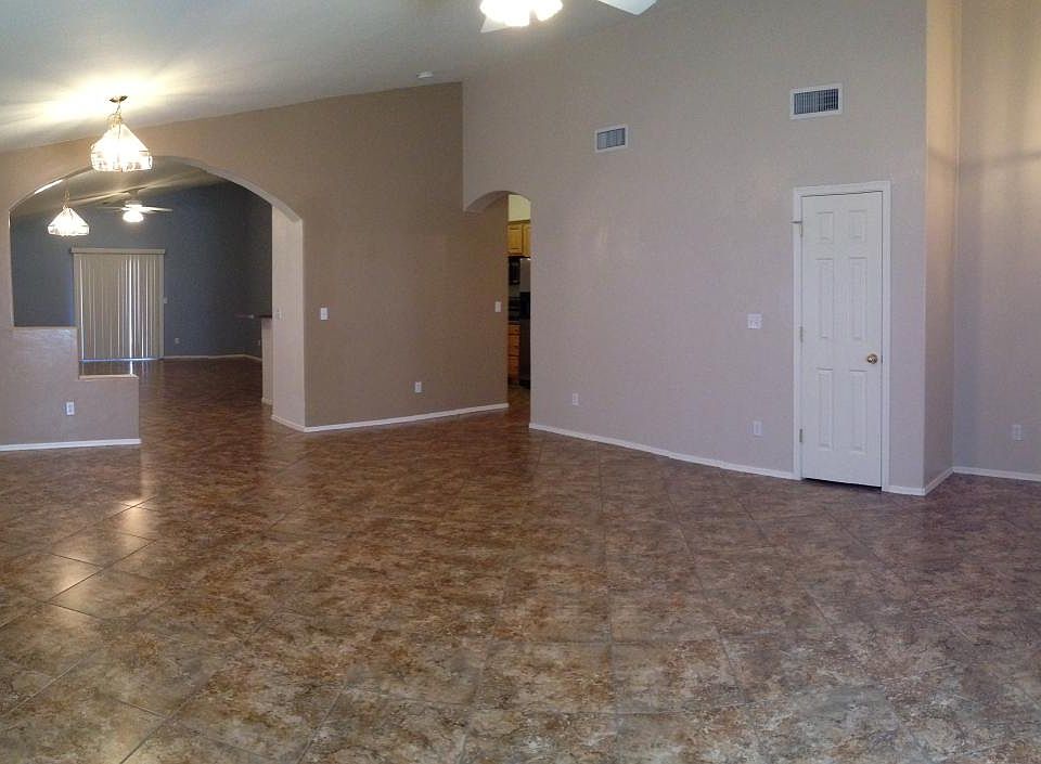 Stunning Living room with ceramic tile and vaulted ceiling