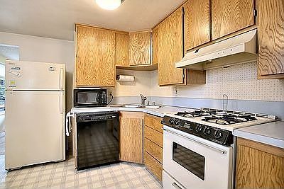 Spacious kitchen with gas range.