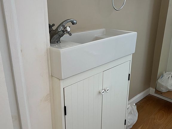 Bathroom sink and cabinet