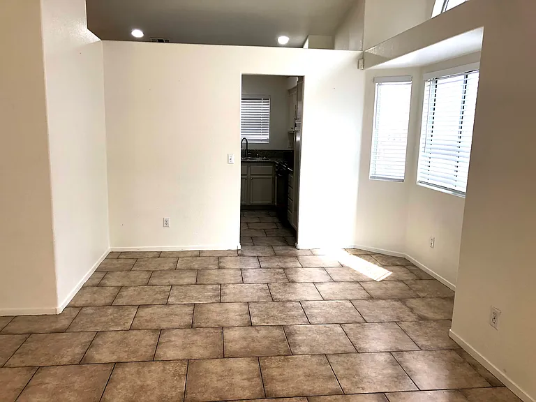Great room area w/bay windows.
