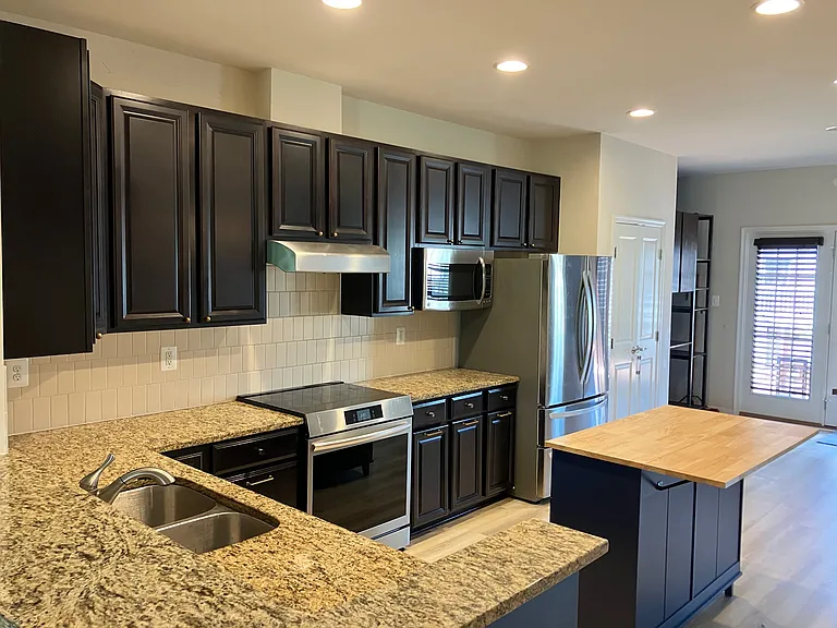 Open Kitchen. Island is included with the rental.