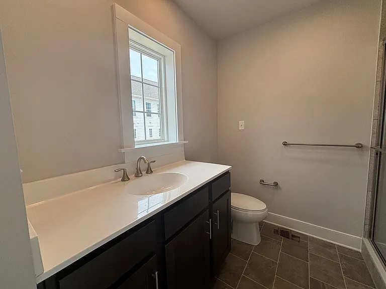 Master Bathroom with walk-in Tile shower