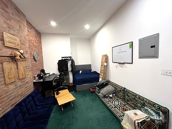 4th image of 261 E 10th St APT 1C