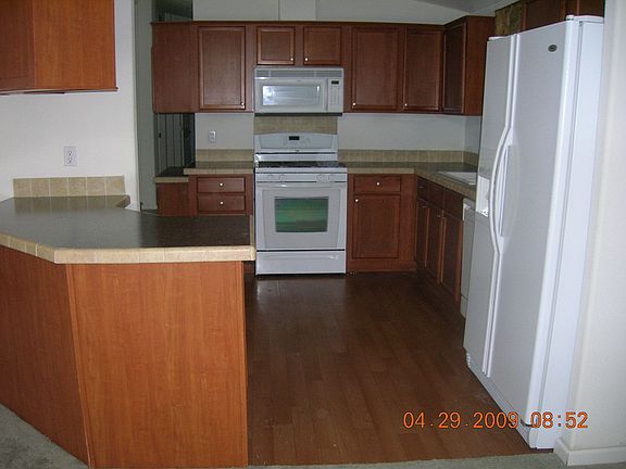 Kitchen has upgraded countertops.