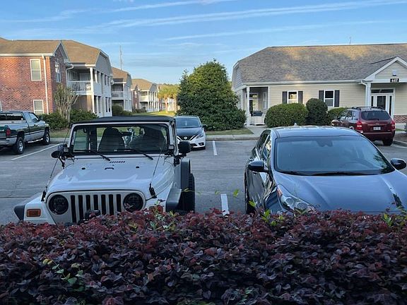 View from front patio. Unit includes one parking space.