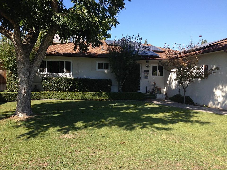 Front of house with walnut tree