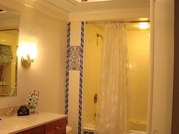 Custom-designed bathroom with skylight, solid maple, Corian