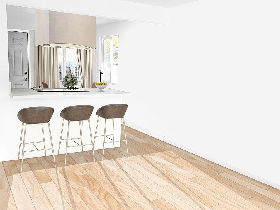 Large Open Concept Living Space With Breakfast Bar.