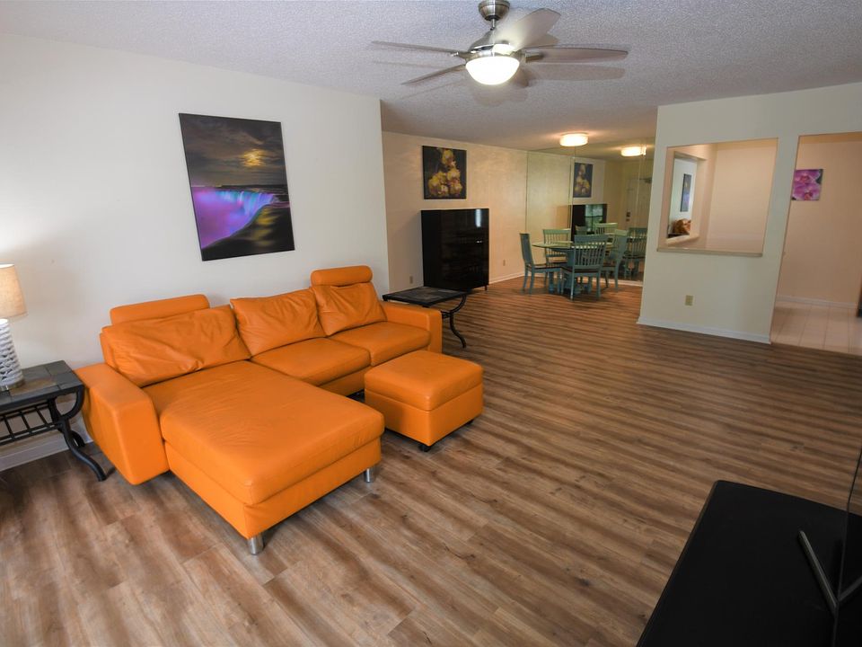 Bright, open concept living area and dining area.