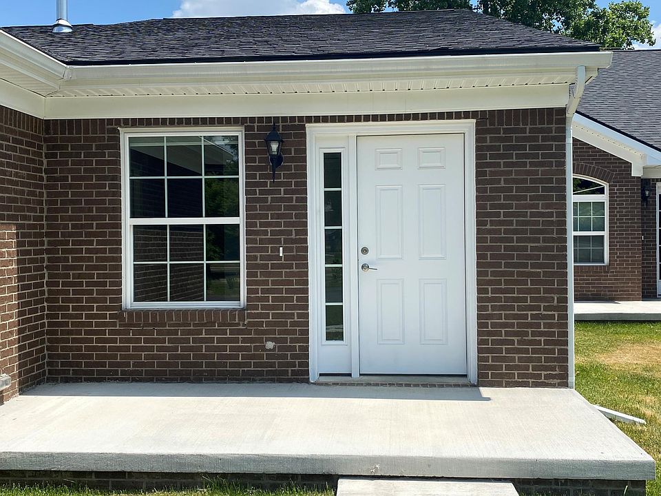 This beautiful front porch is the perfect spot to unwind and enjoy the outdoors. With plenty of space for seating, it''s ideal for relaxing with a cup of coffee in the morning or hosting guests in the evening.