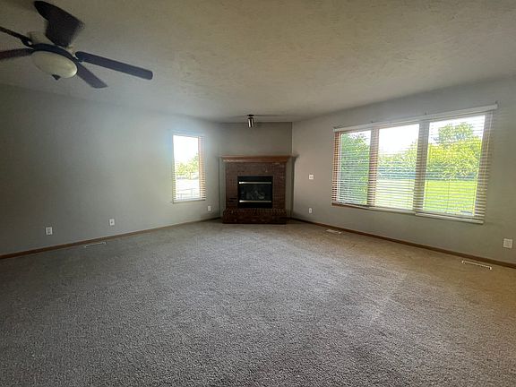 Family room area with fireplace.