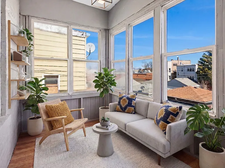 enclosed porch (virtually staged)