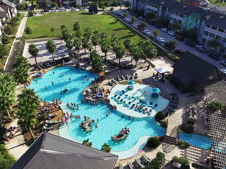 Experience luxury living with this stunning poolside view at our premier apartment community.