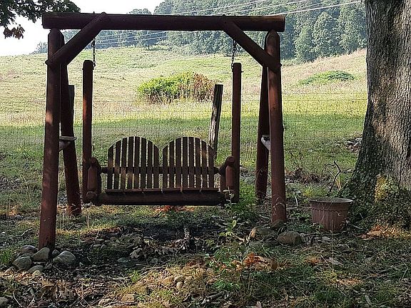 Swing in front yard.