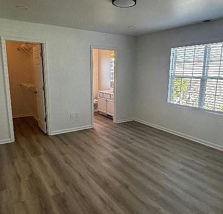master bedroom with walkin closet and private shower