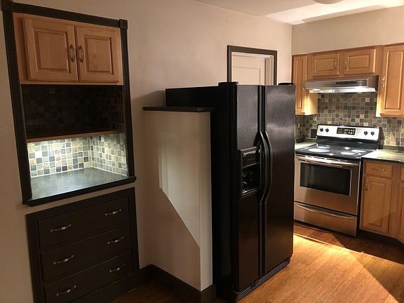 Kitchen with built-in storage & cabinets