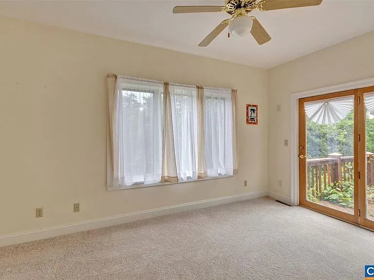 This bedroom is downstairs. It can be used as playroom if you have toddlers or a room home office or craft room. It steps out onto the entertainment deck.