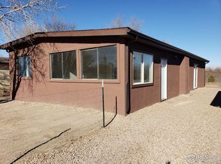 212 Crest Dr, Log Lane Village, CO 80705