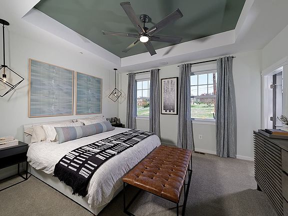 The primary bedroom of the Sage townhome at Nexton by Brookfield Residential.