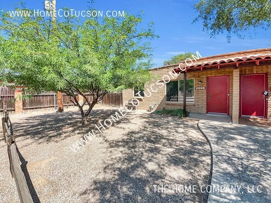 1725 E Adelaide Drive: Charming Brick Home with Private Fenced Yard — Photo 3
