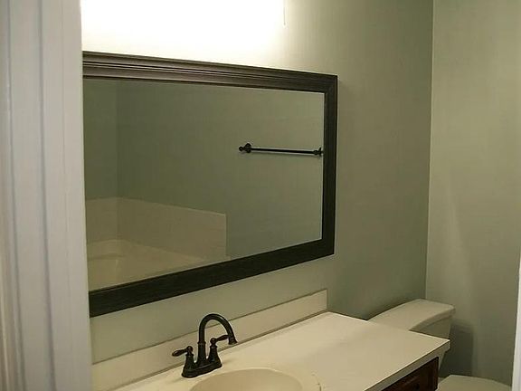 Master bathroom but has been upgraded since photo