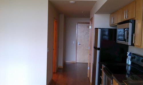 Enrty with bathroom door to left