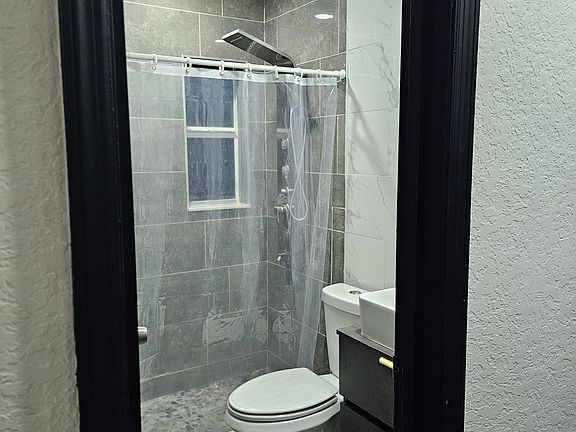 5th image of 4385 SW 51st St