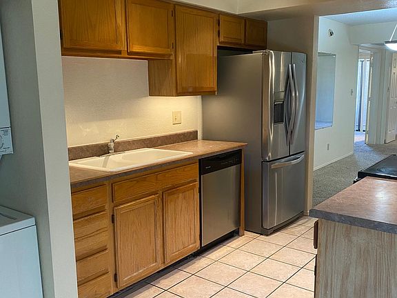 5th image of 9550 N 94th Pl Unit 207