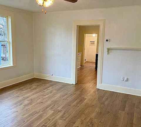 View of living room into kitchen / dining