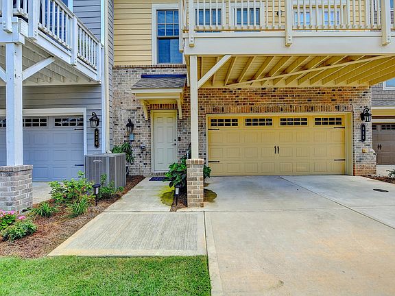 Entrance door which is next to garage.