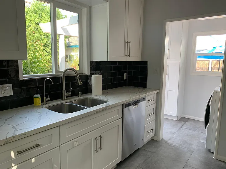 Kitchen looking into laundry room.