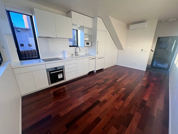 Great room view. Space for dining, lounging and entertaining.