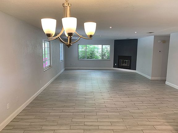 Living room w/ pool view