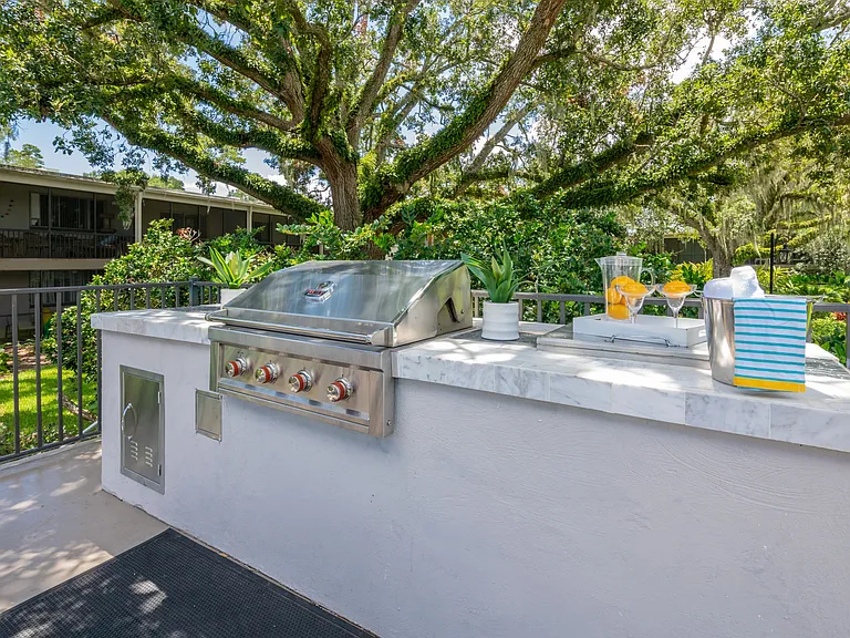 Unleash your inner grill master at our outdoor kitchen, designed for delightful gatherings. Be the host with the most!