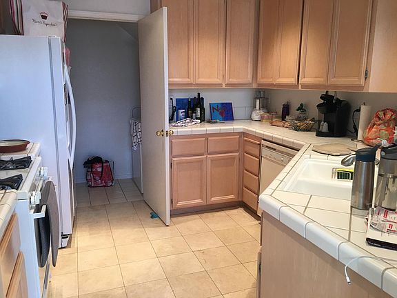 Kitchen and laundry area behind