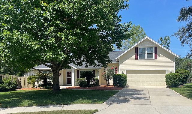 Front of house and driveway.