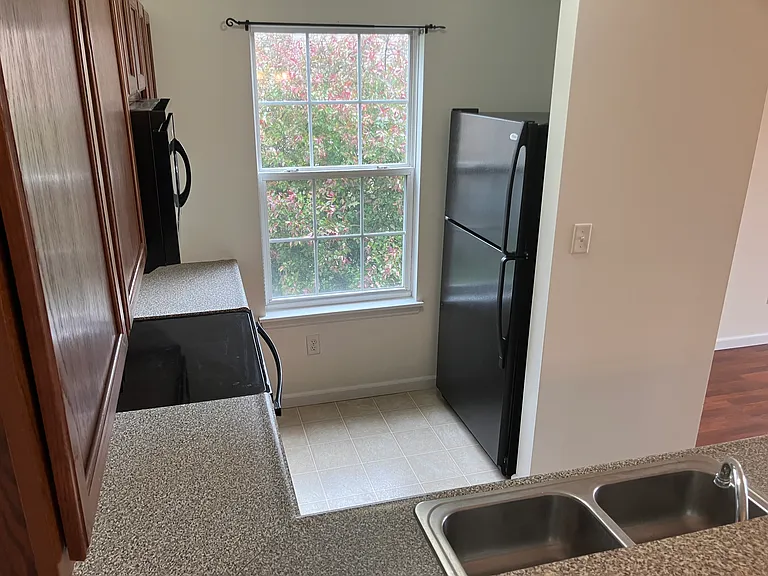 Additional view of the kitchen.