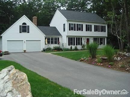 Beautiful Colonial : Property is beautifully landscaped with brick paver walkway